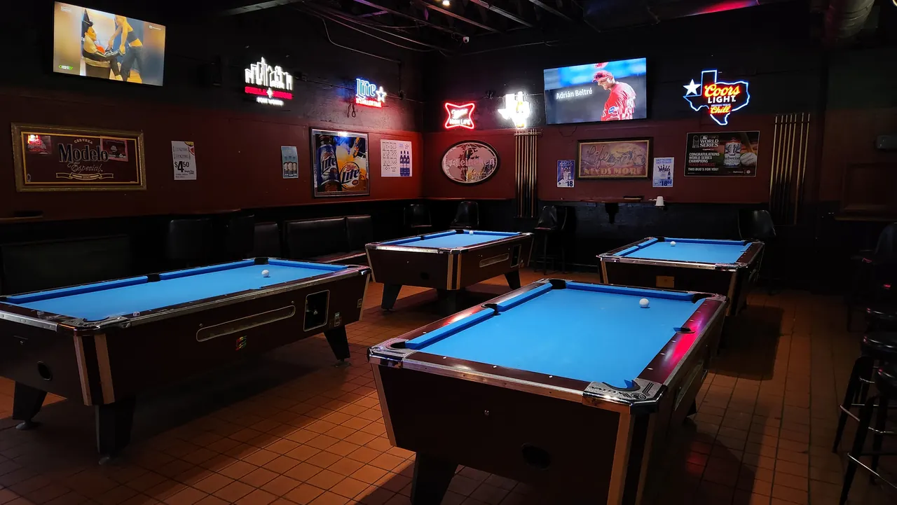 The four Sparks pool tables from the opposite side of the room
