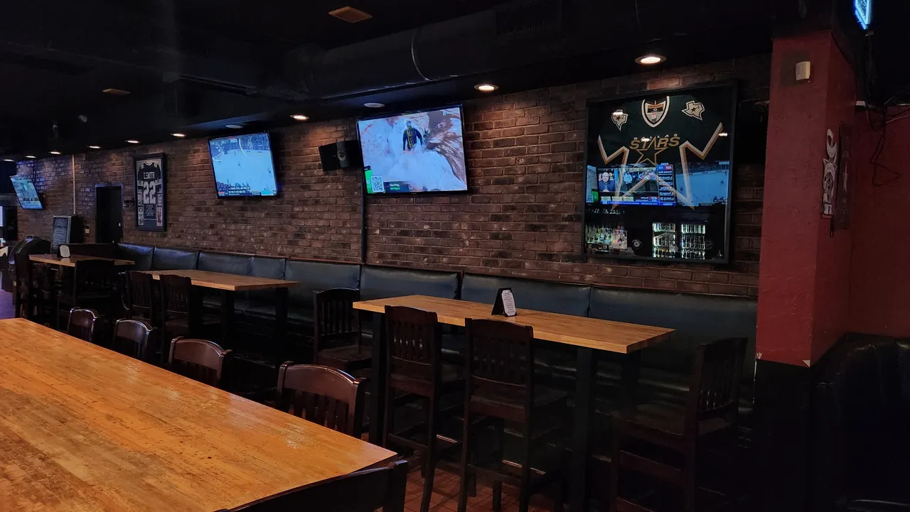 Tables and seating inside Sparks Sports Bar
